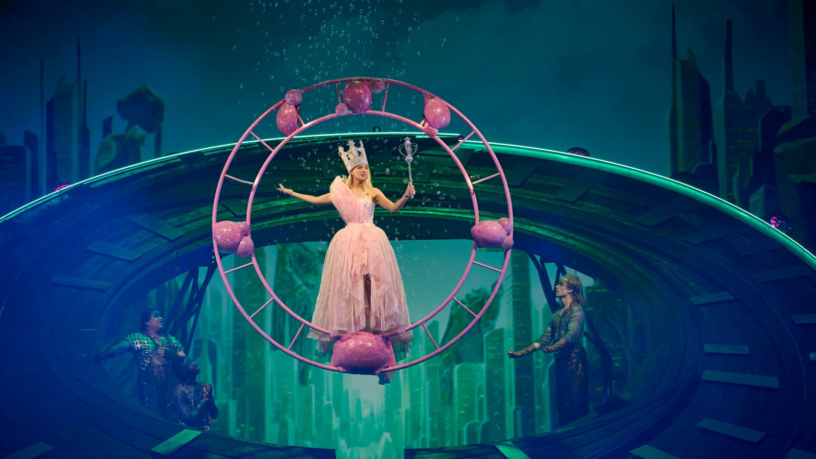 Princess in pink dress balancing on a flying circle