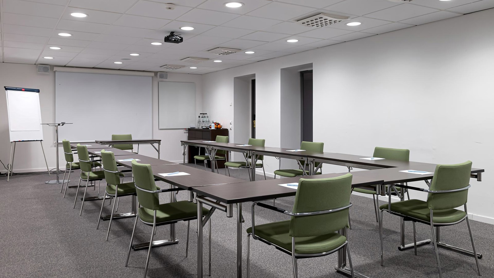 Conference room with green chairs