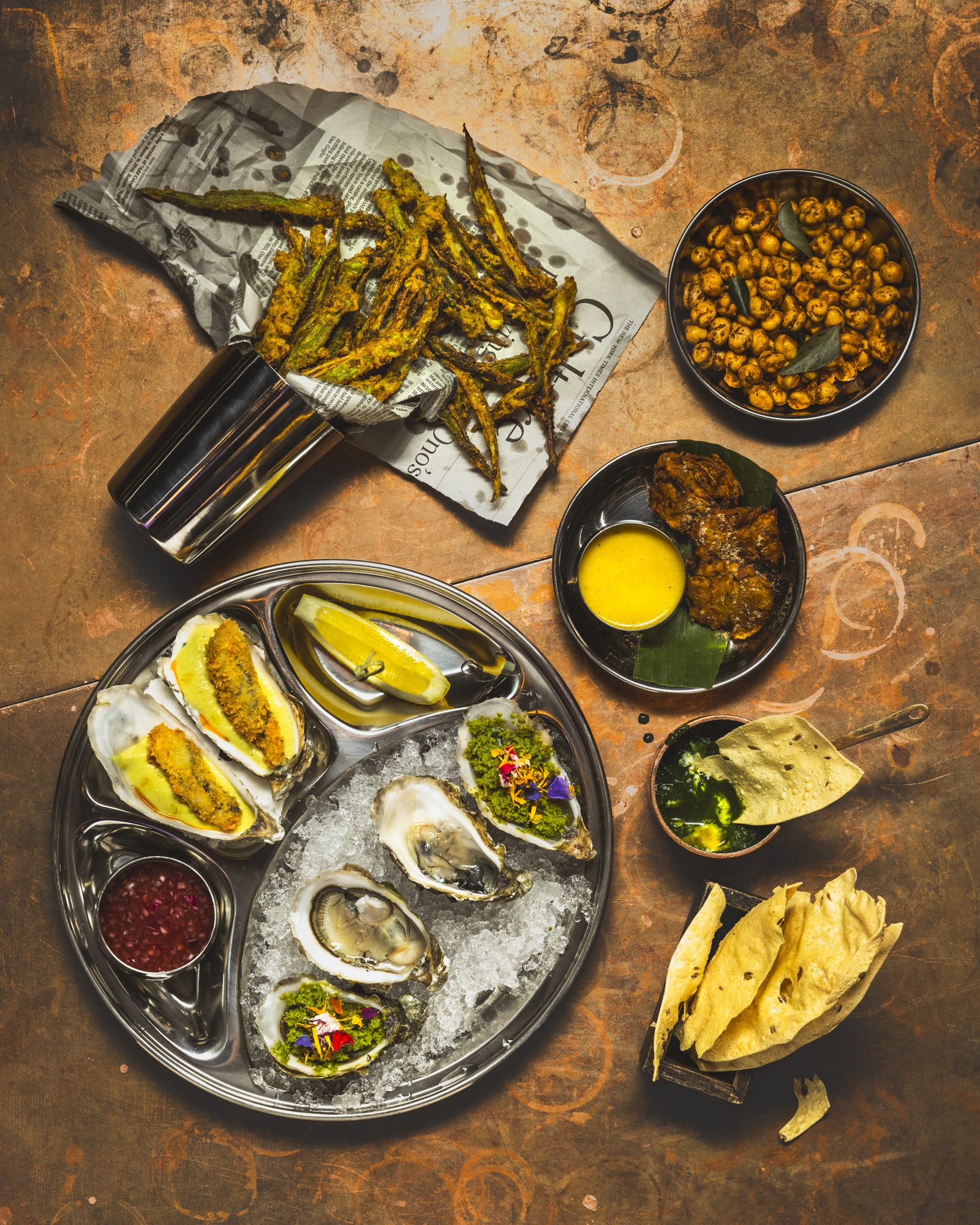 Indisk mat med ostron och snacks