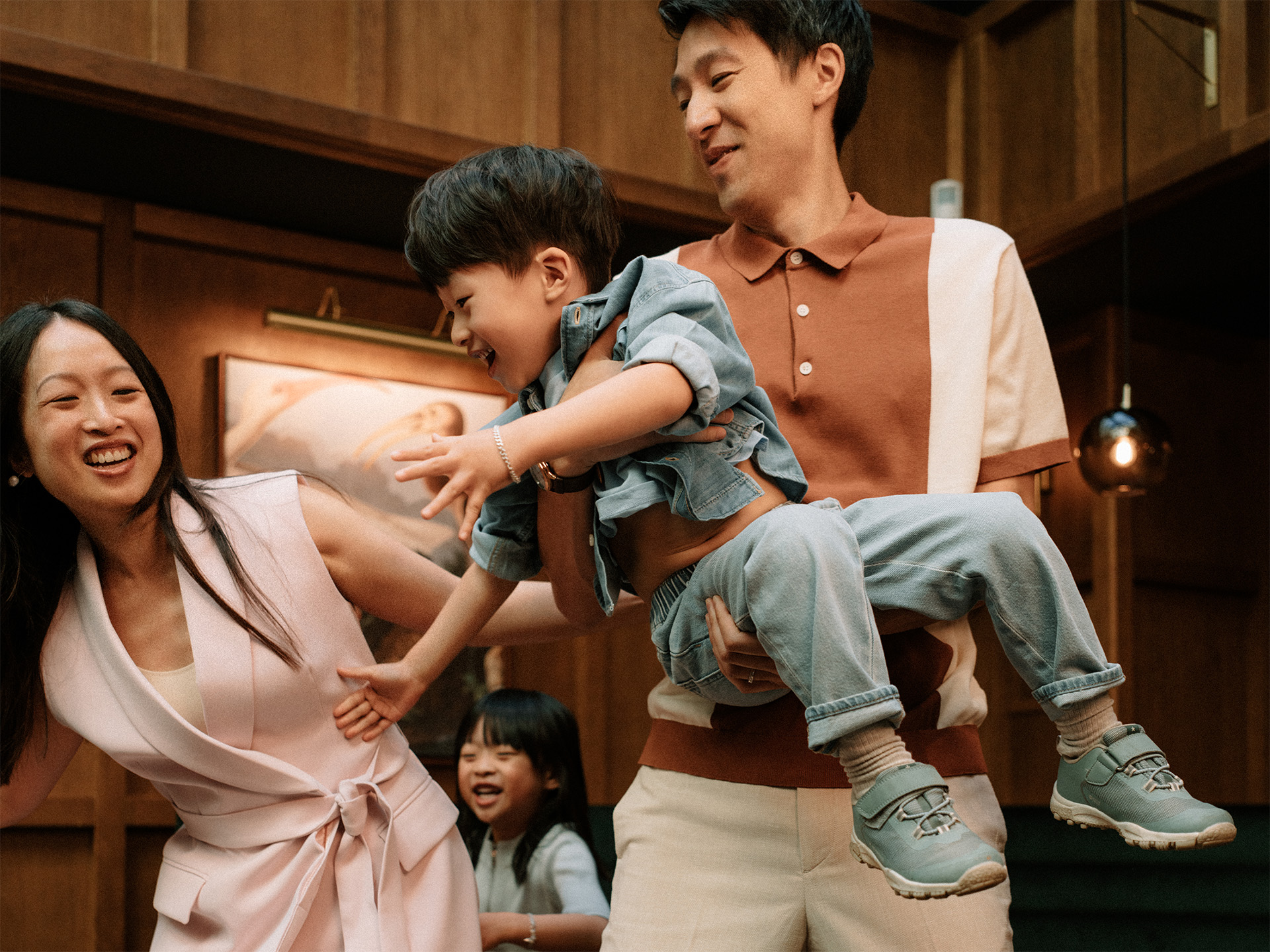 Girl in green dress drinking milkshake with straw