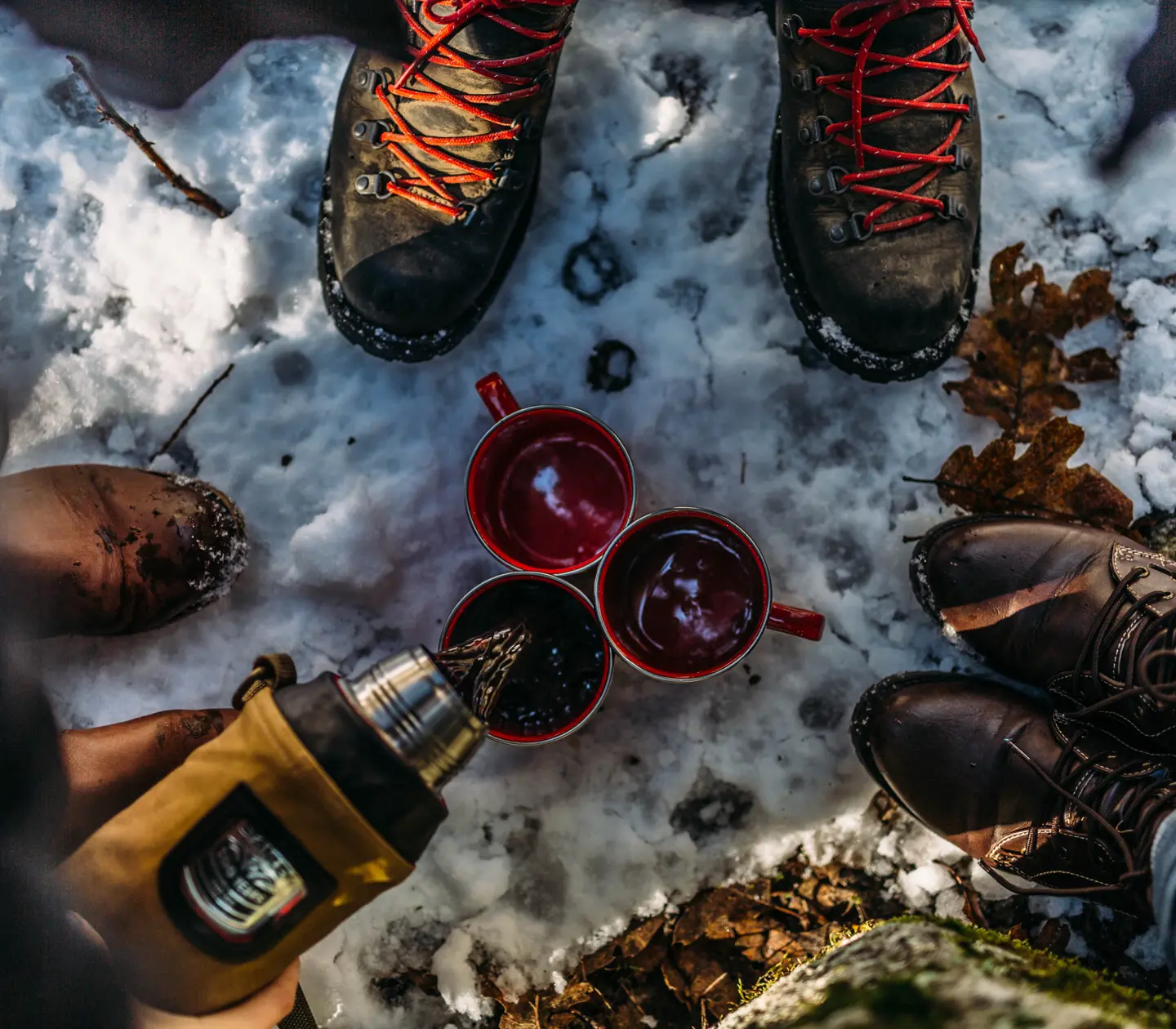 Coffee and shoes in a winter landscape