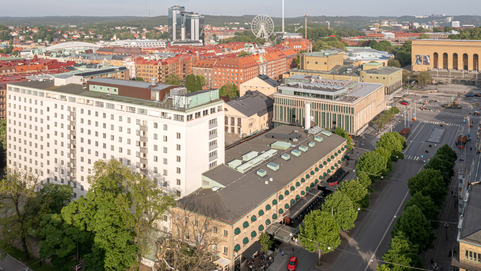 Drone image of the Elite Park Avenue Hotel in Gothenburg with Liseberg in the background