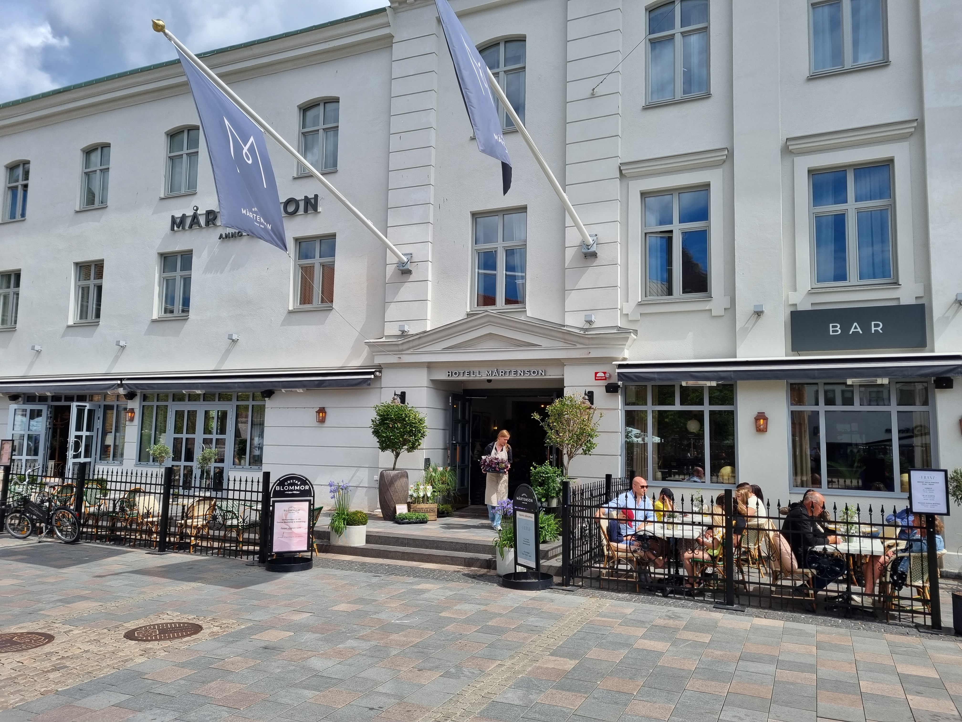 Mother and daughter checking into hotel