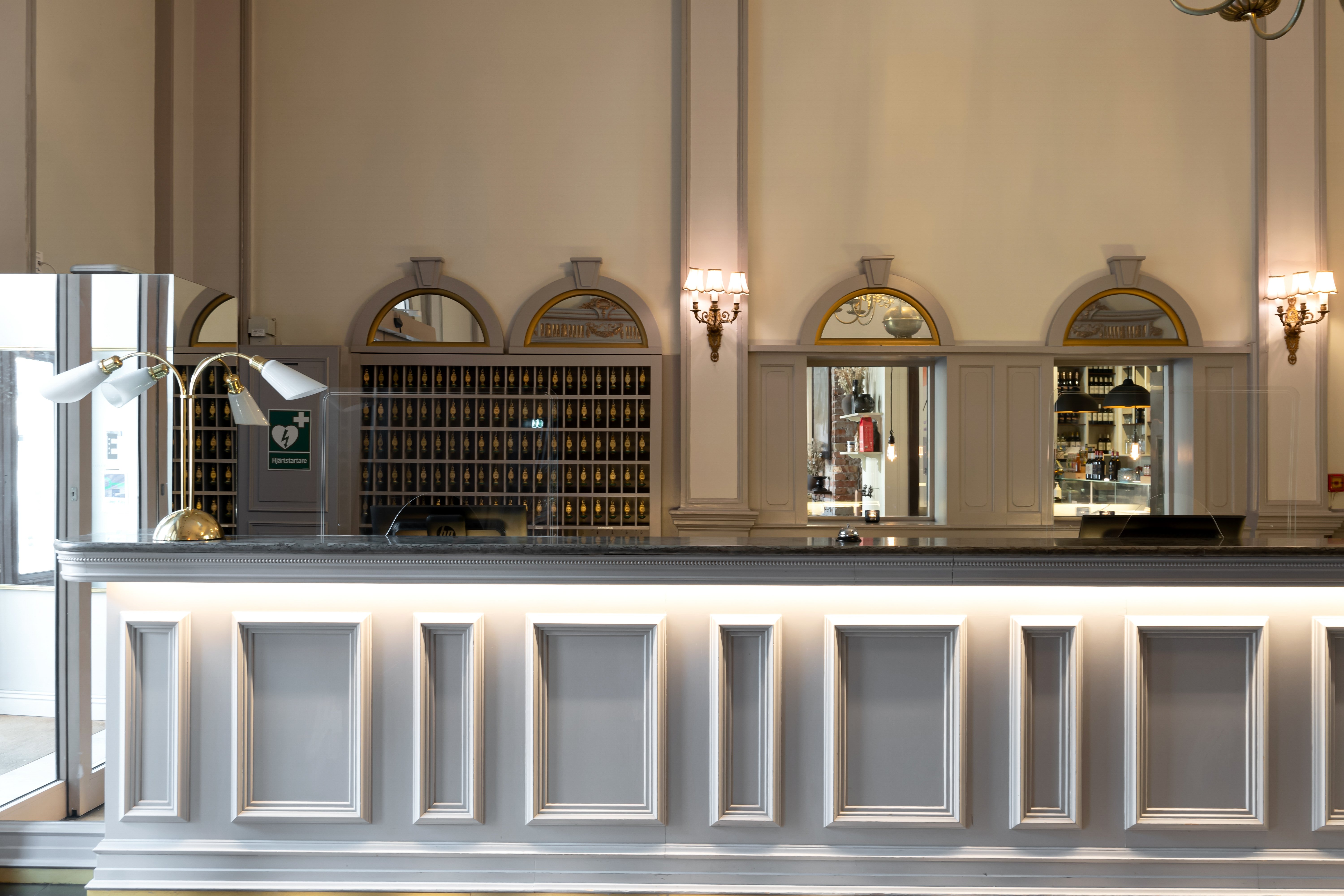 Bright reception desk with keys in the background