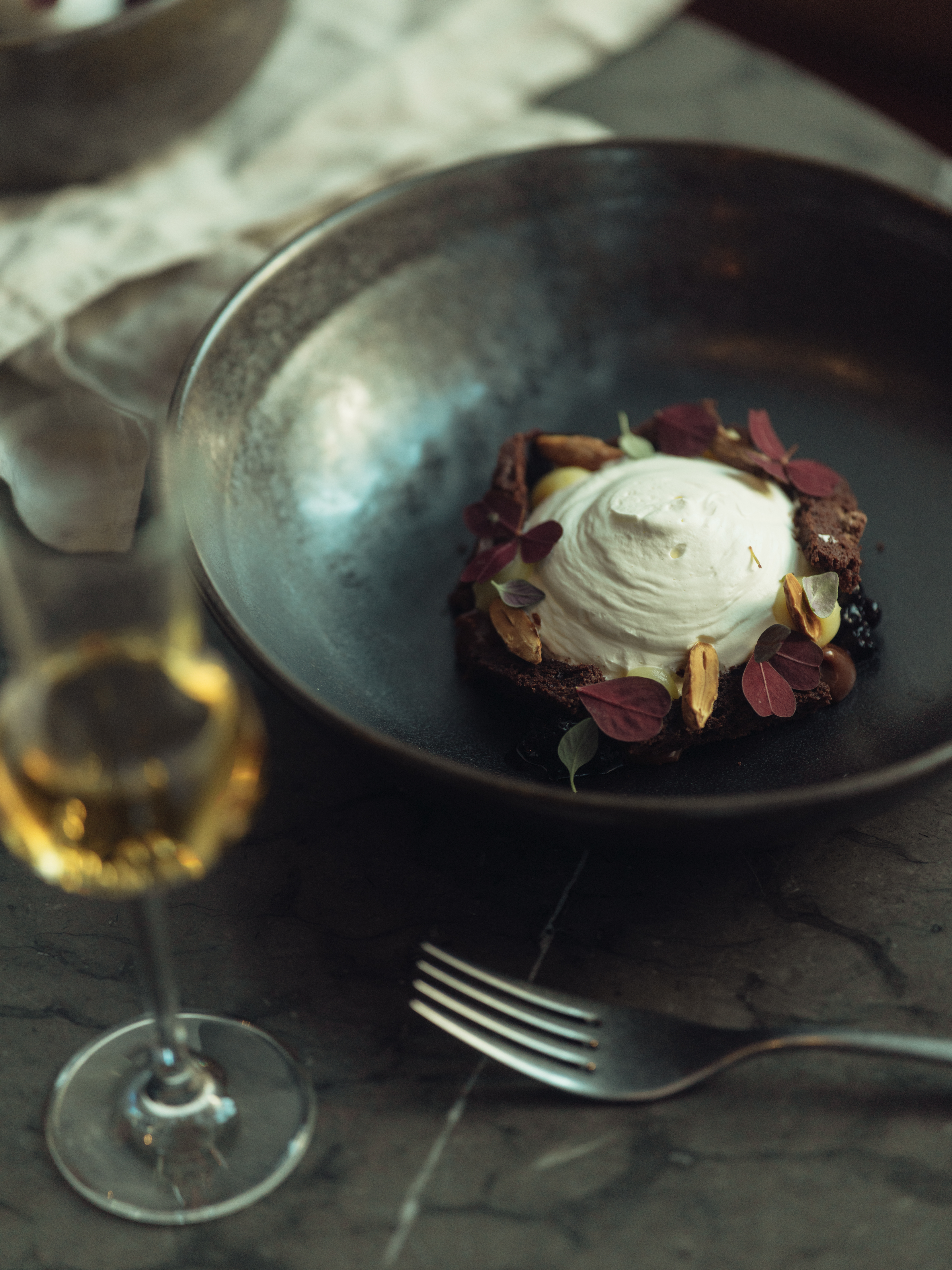 Dinner table with food and wine