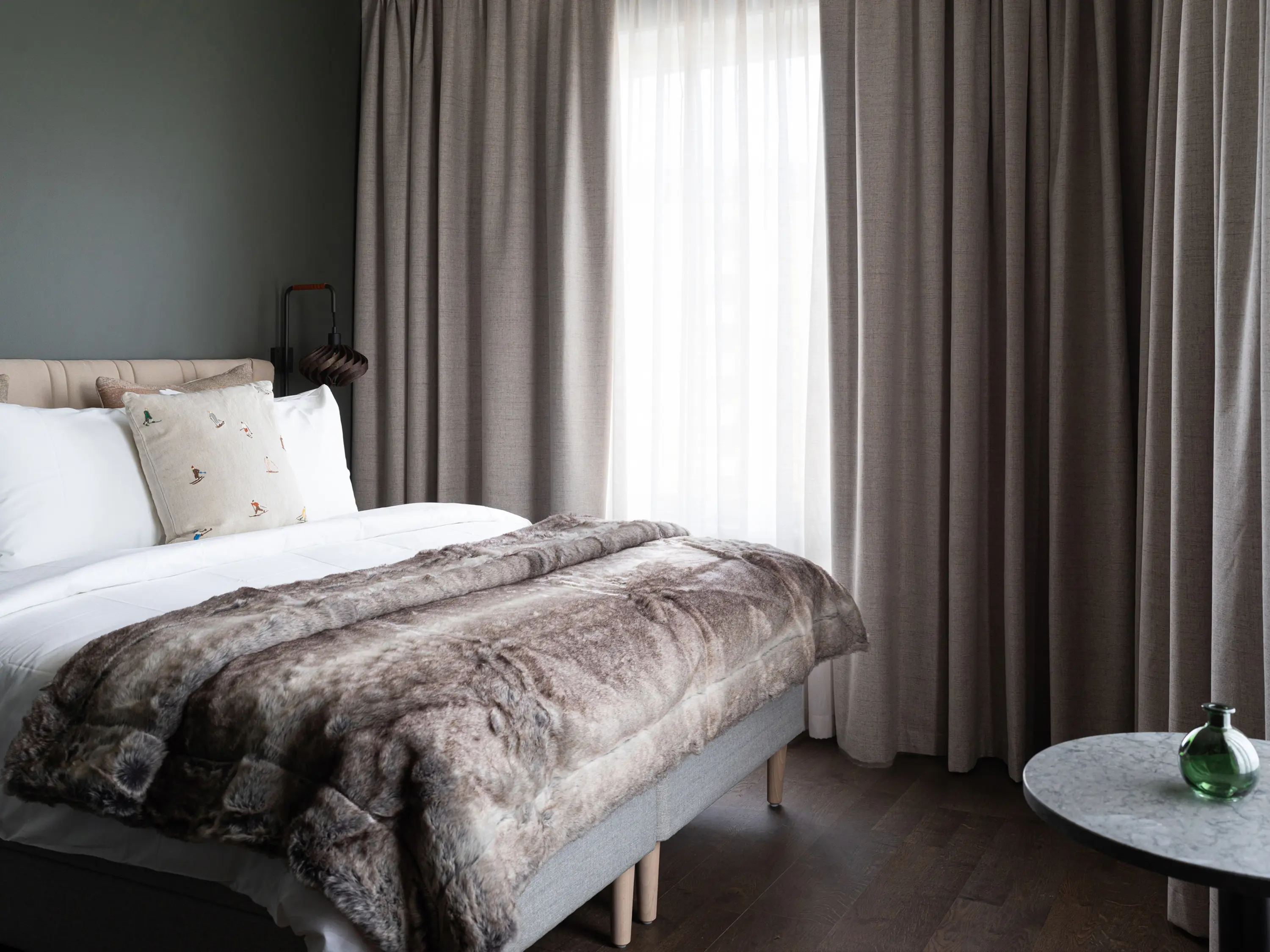 Made bed in a Standard room at Elite Hotel Frost.