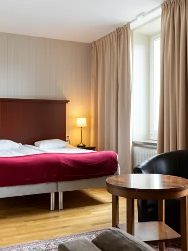 Cozy hotel room with double bed