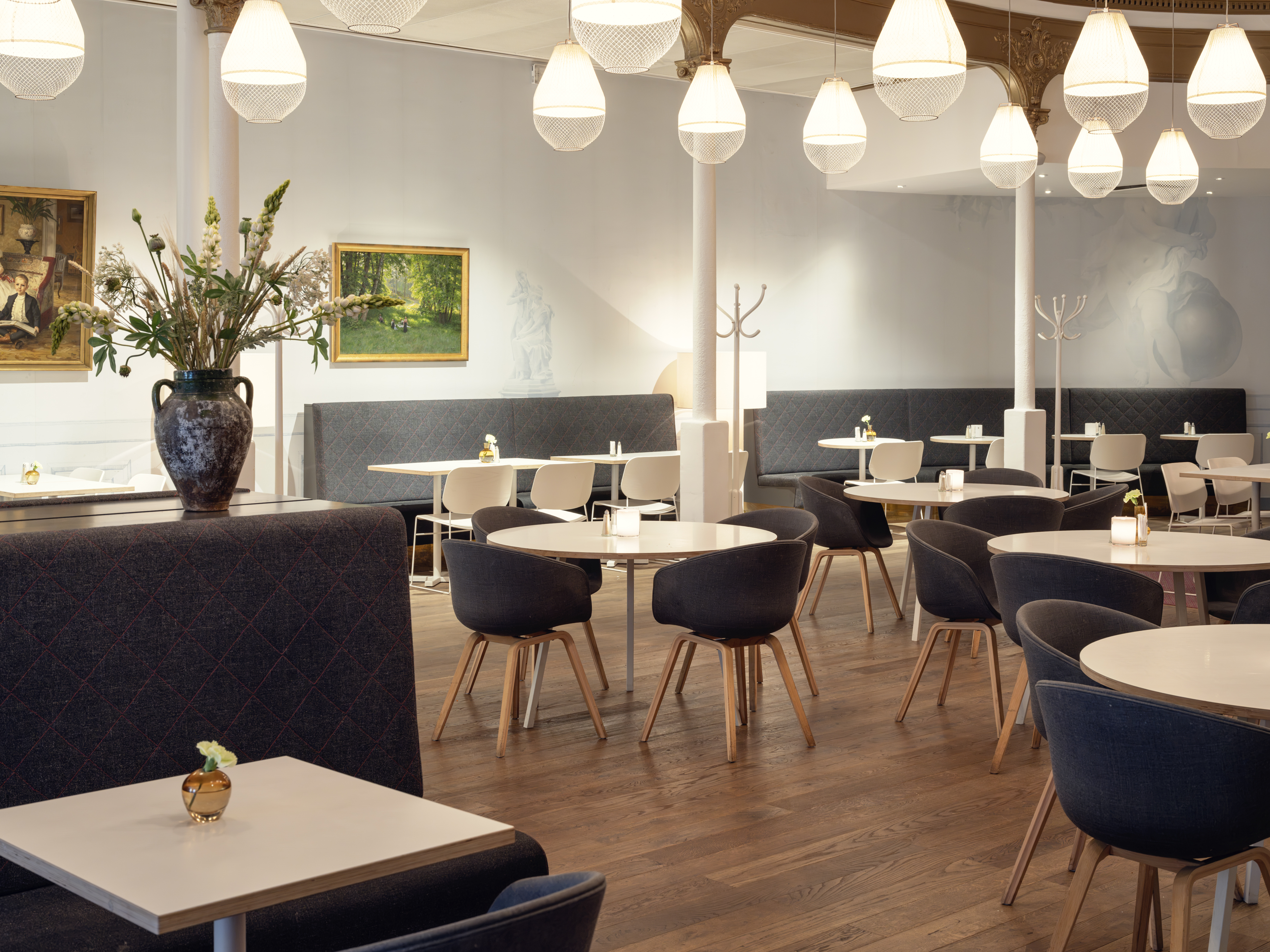 Modern restaurant interior with round tables