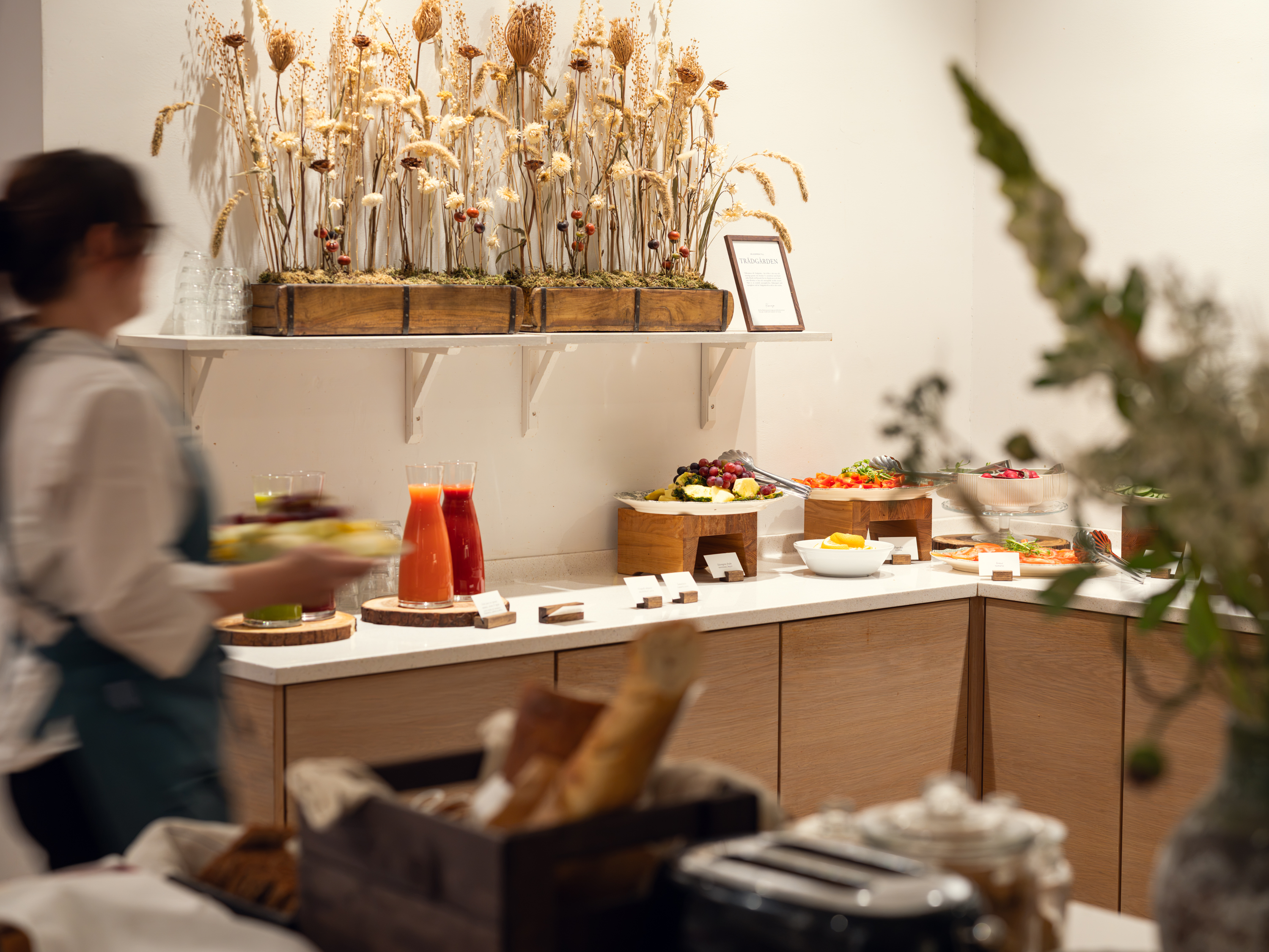 Hotel breakfast buffet with dried flowers