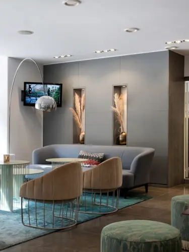 Hotel reception with armchairs and reception desk