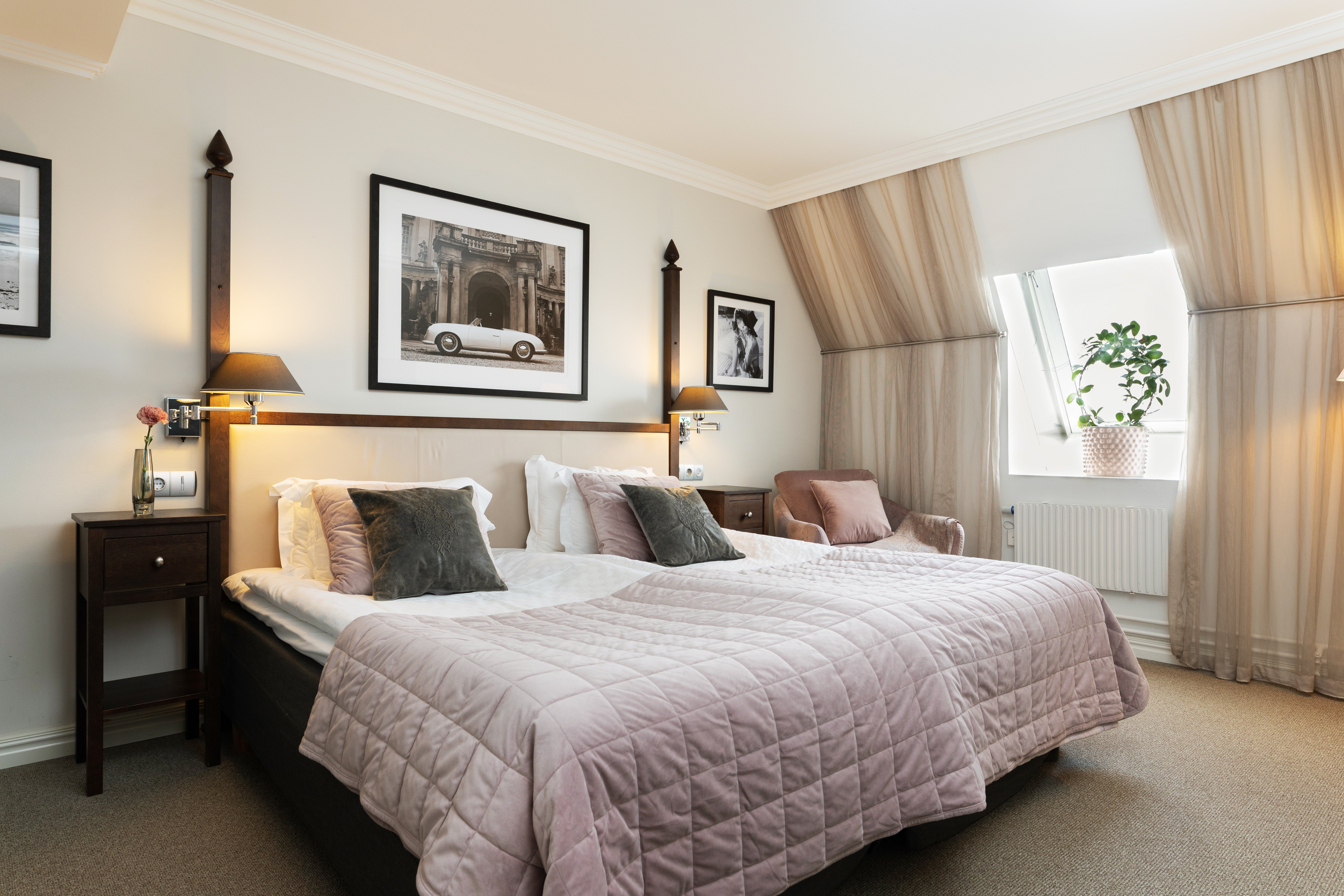 Cozy suite with bed, armchair and window