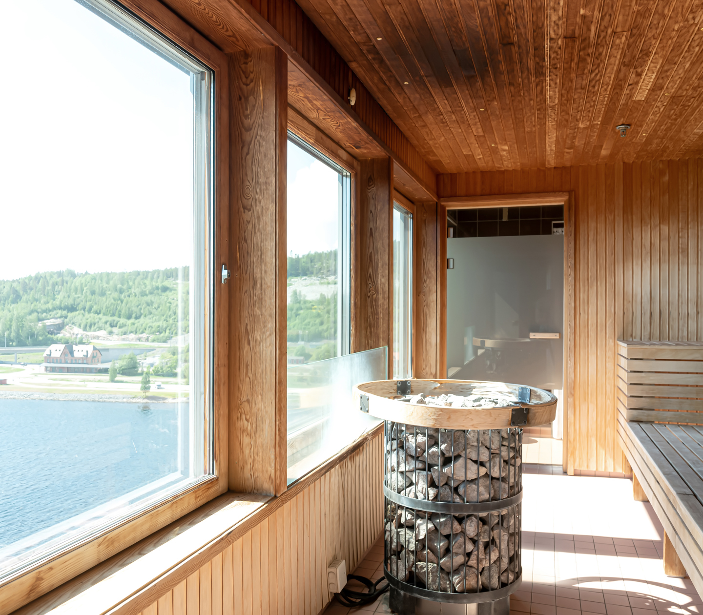 Sauna with large windows and a sea view