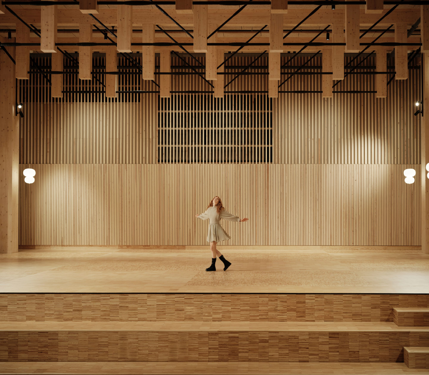 Woman dancing in open wooden room