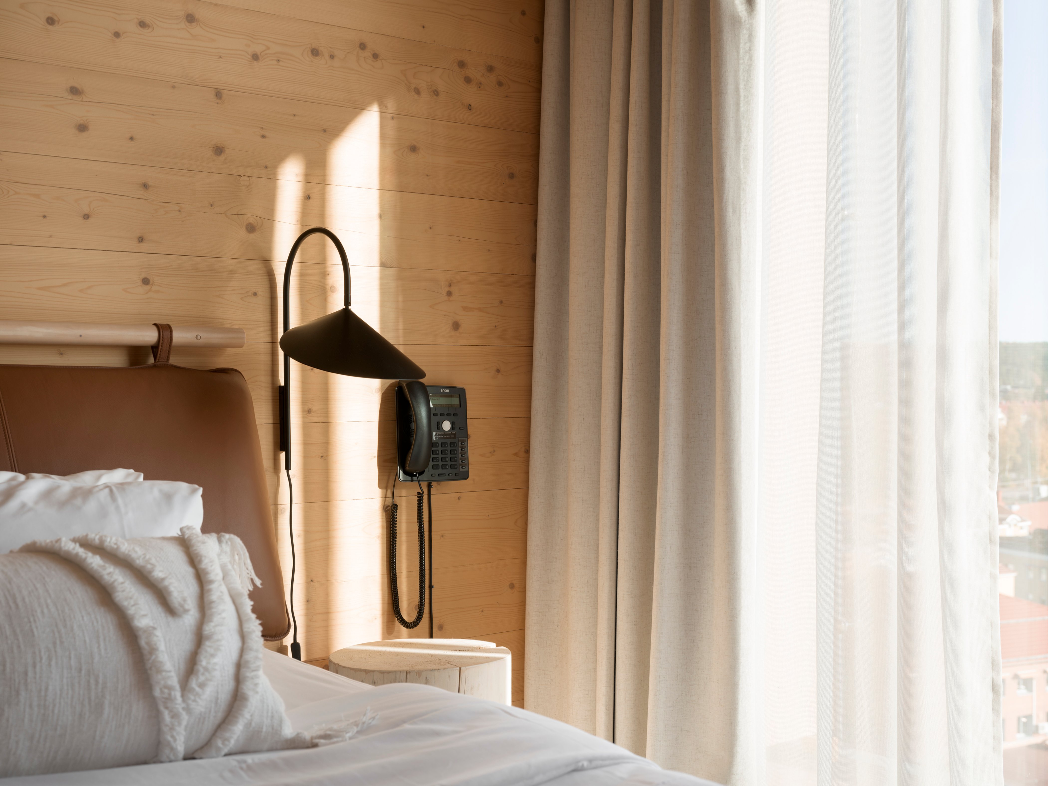 Säng i svit på The Wood Hotel by Elite