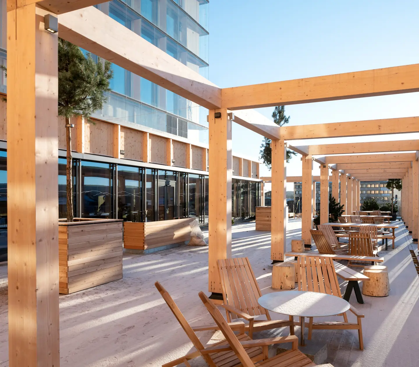 Outdoor seating with lounge furniture and trees