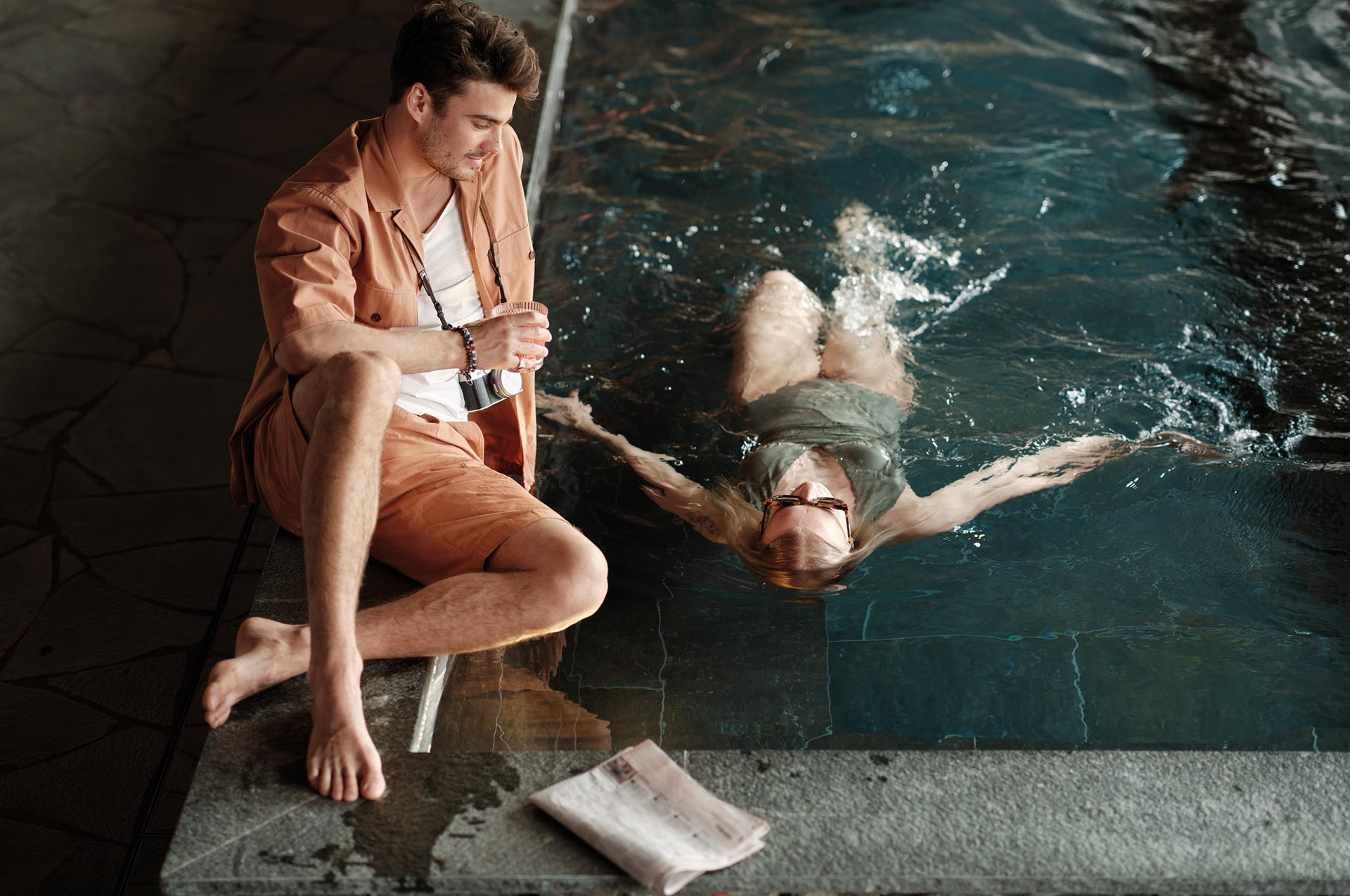 A couple by the pool