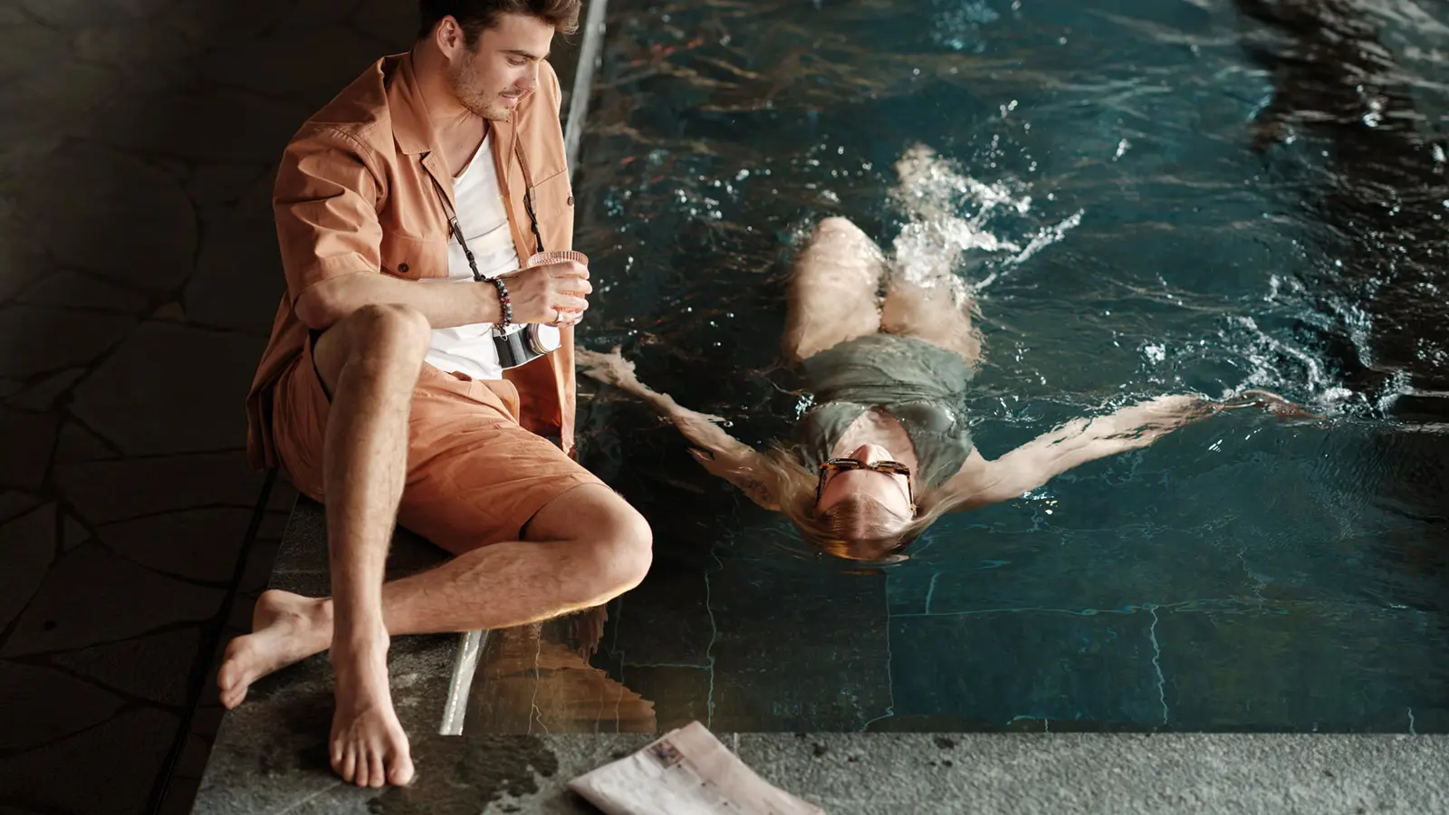 A couple by the pool