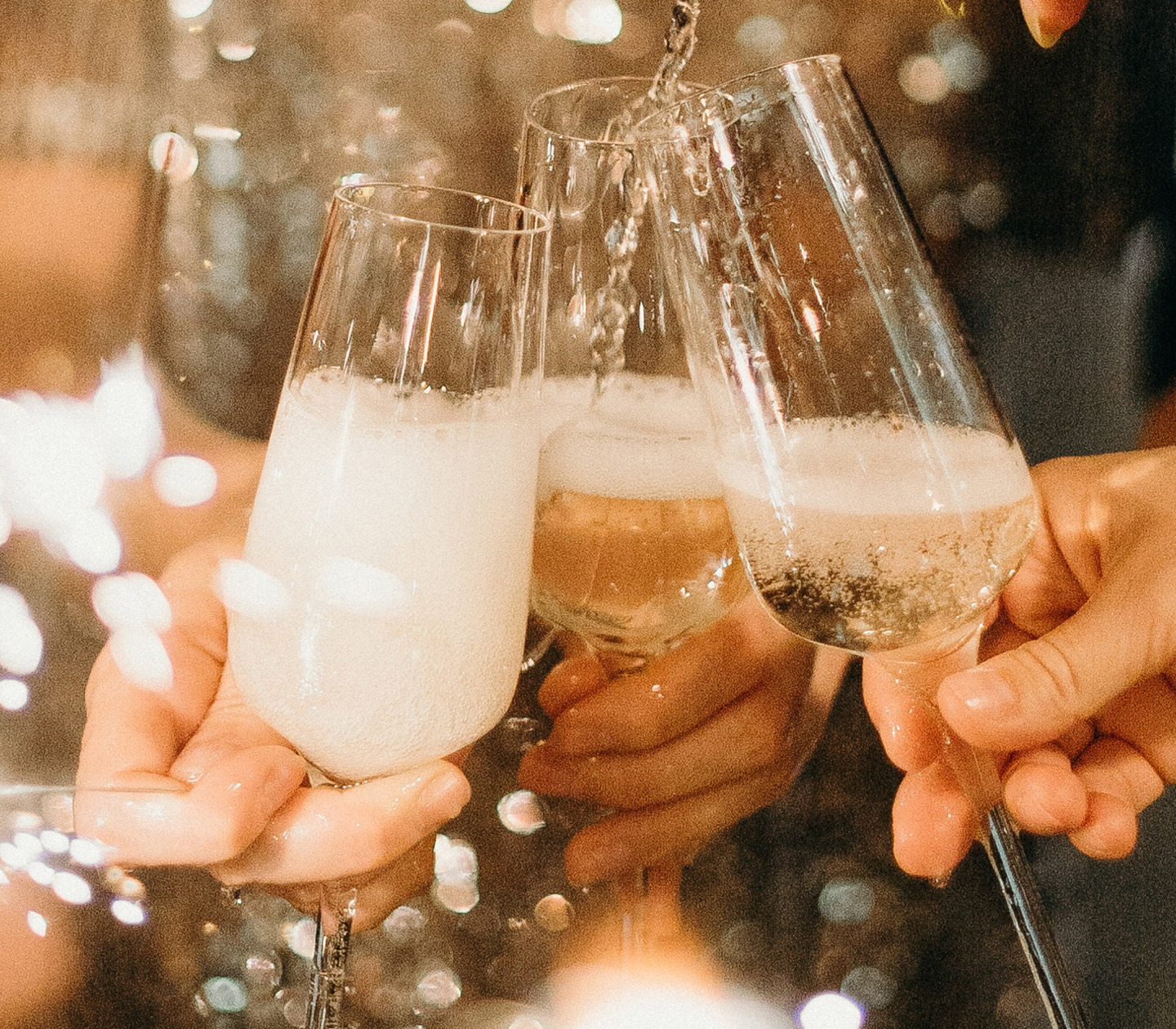 Champagne glasses in a festive setting