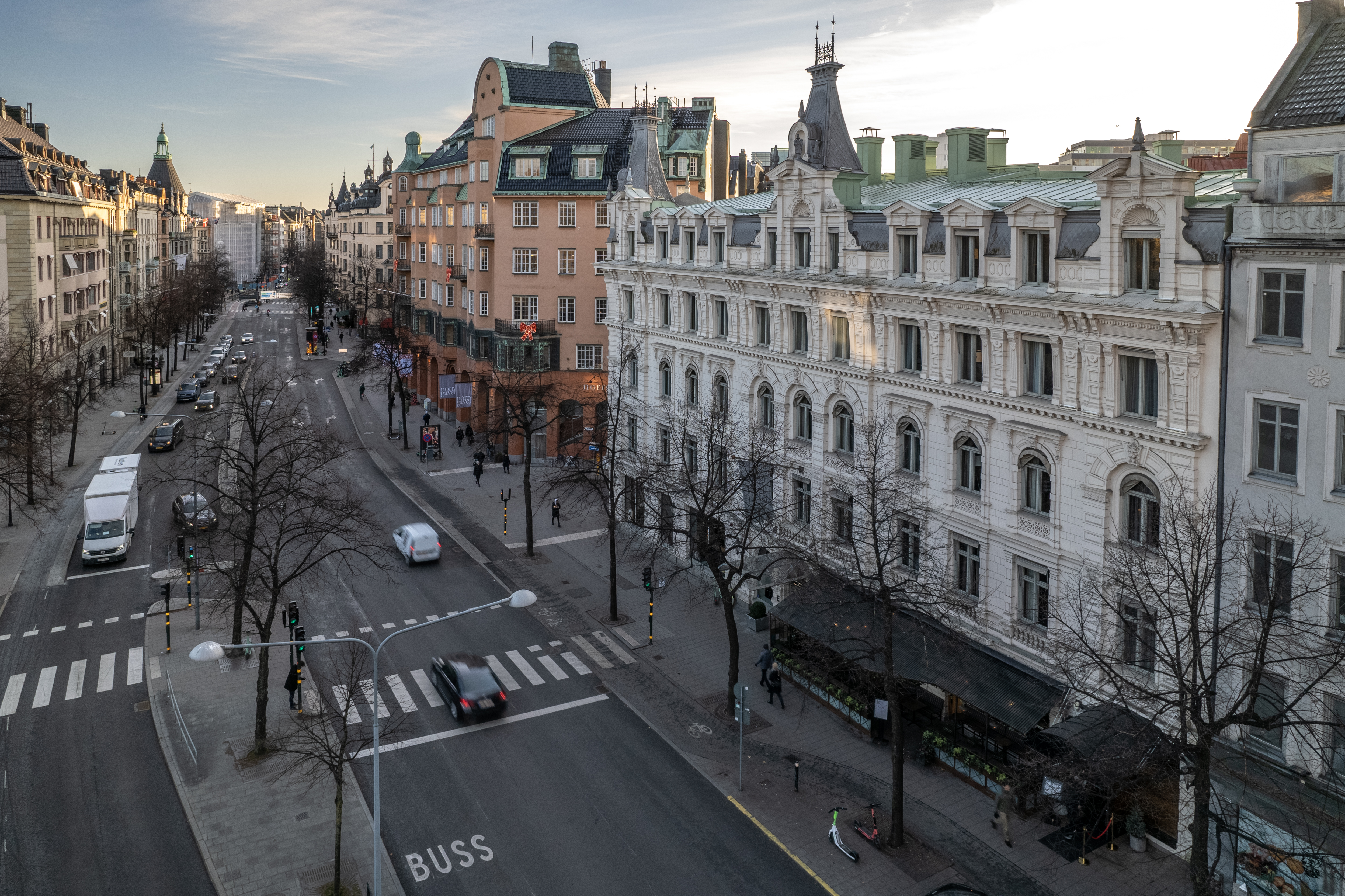 The white facade of Elite Hotel Stockholm Plaza photographed from above with Birger Jarlsgatan outside