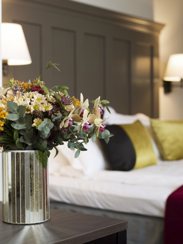 Hotel room with flower bouquet