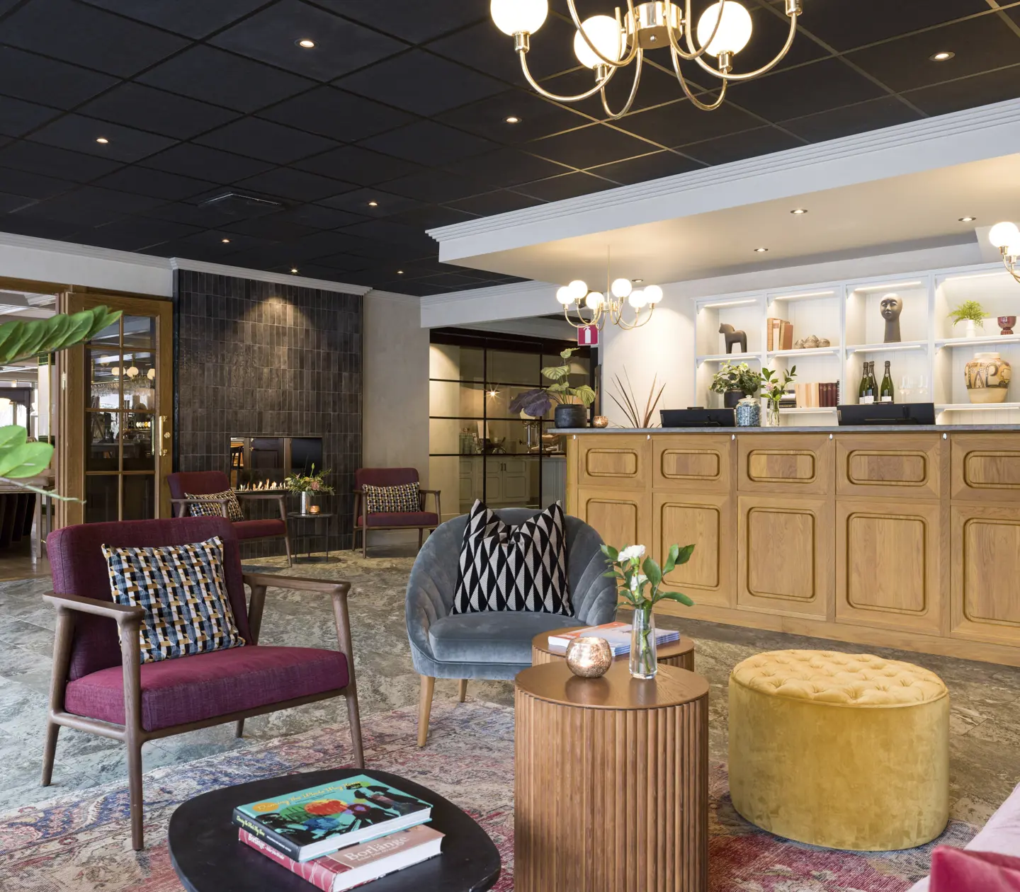 Elegant and inviting hotel lobby with trendy decor and comfortable seating in Borlänge, Sweden.