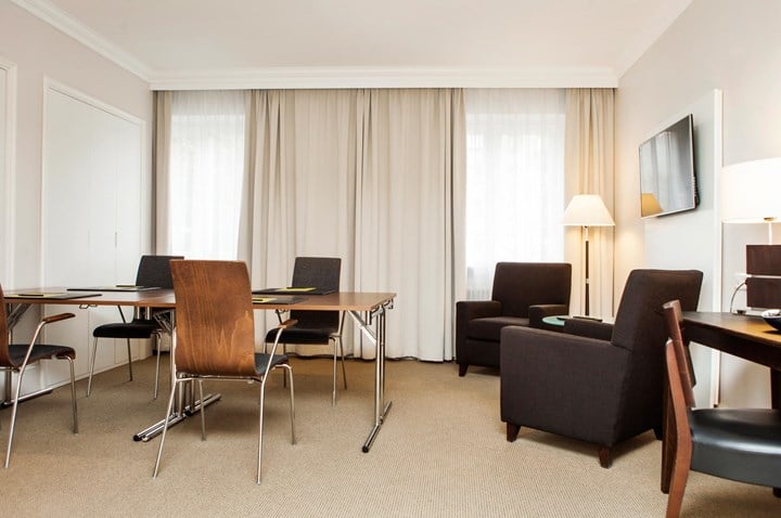 Conference room with armchairs and chairs