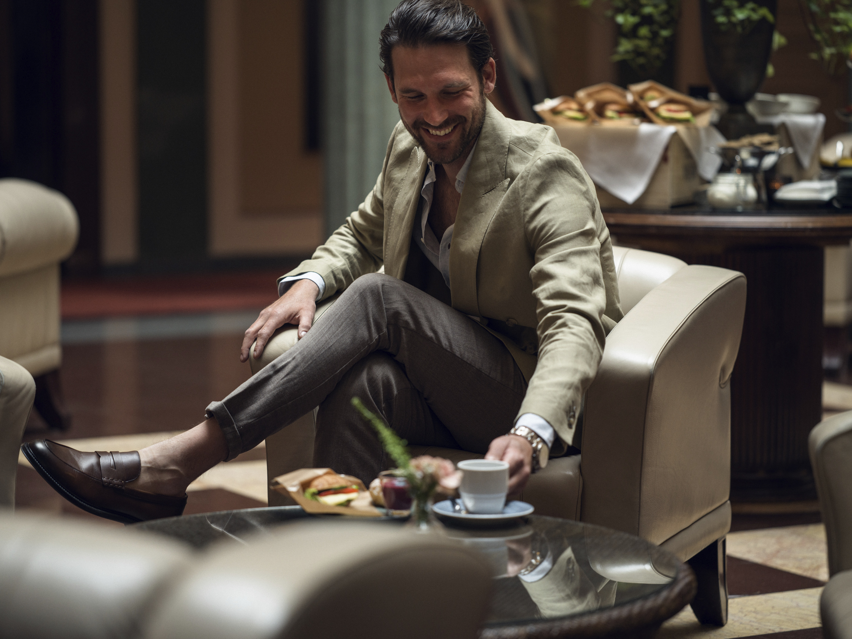 Courtyard with armchairs and blue pillars