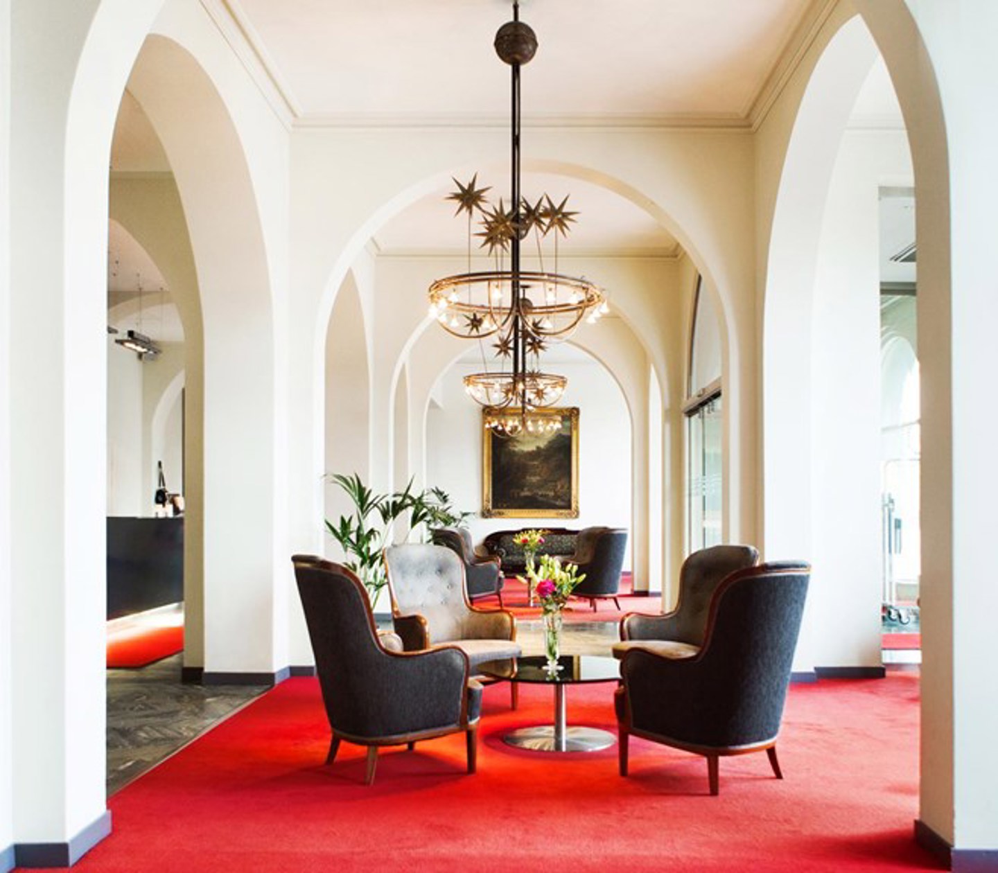 A lobby with armchairs