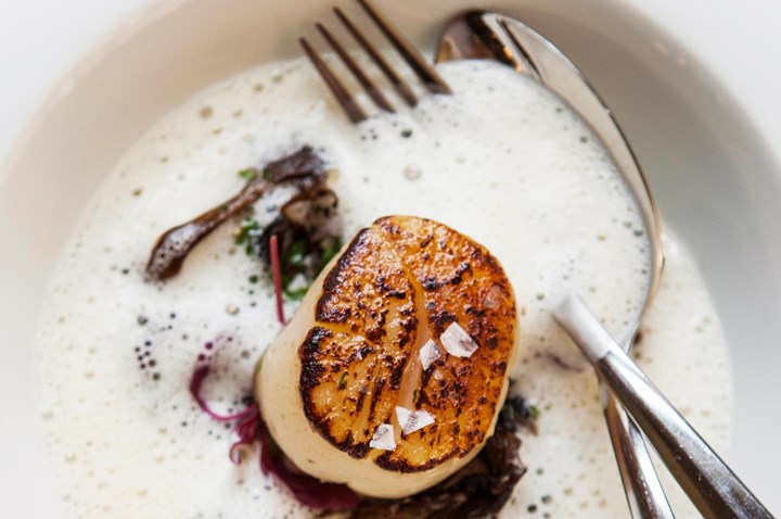 A dish with white sauce