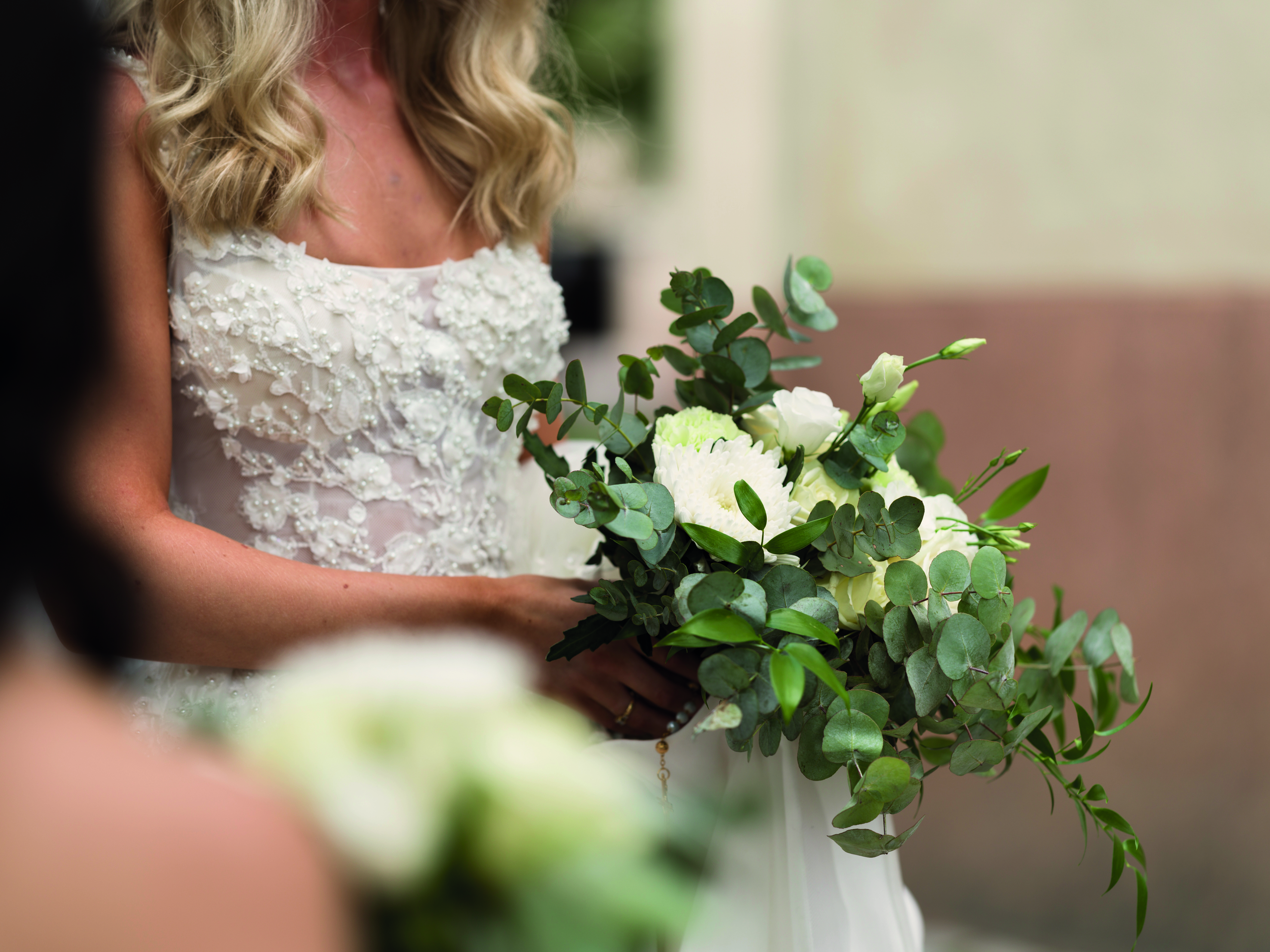 A building in Eskilstuna lights up in rainbow colors that are reflected in the lake