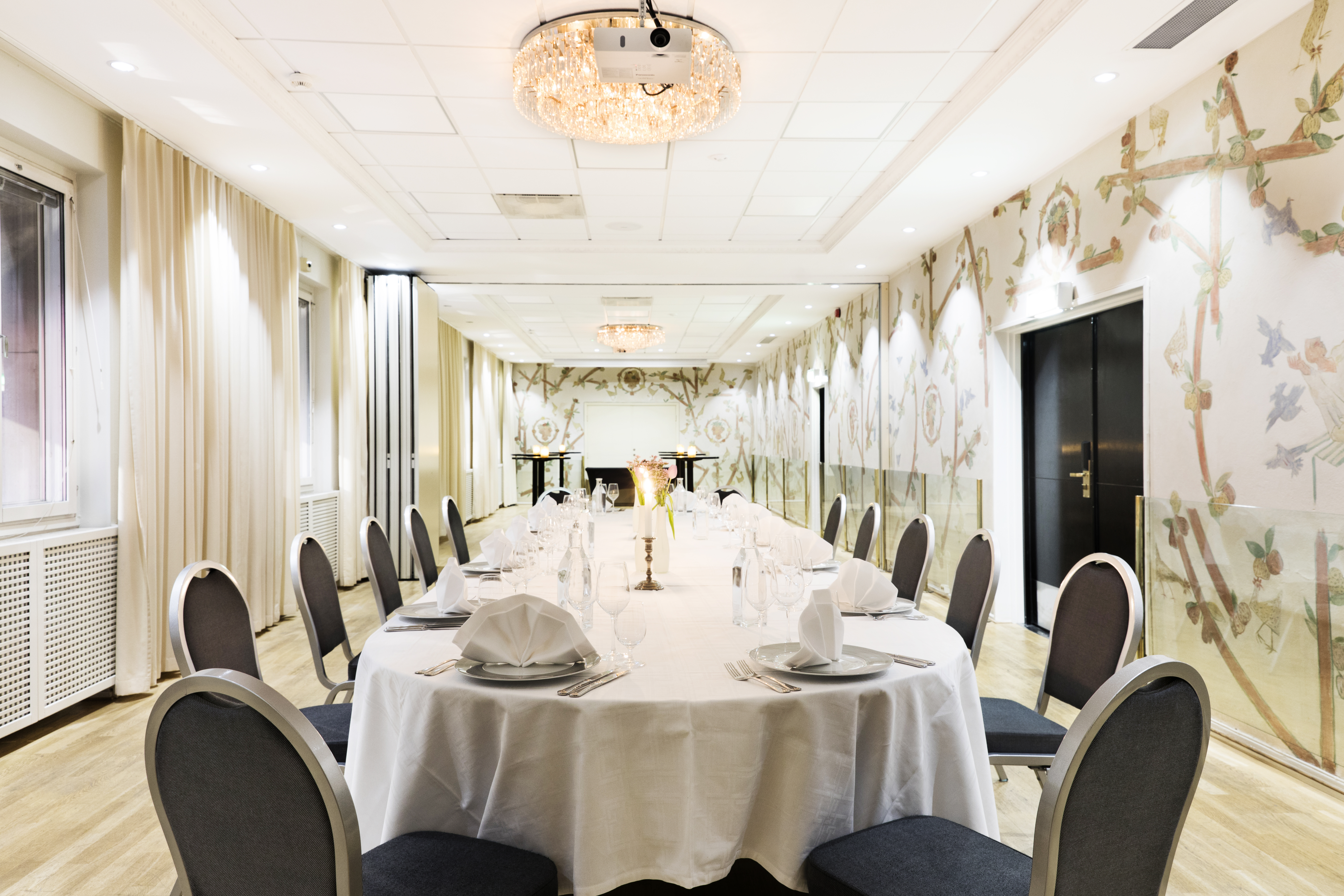 Bright hall with large oblong table