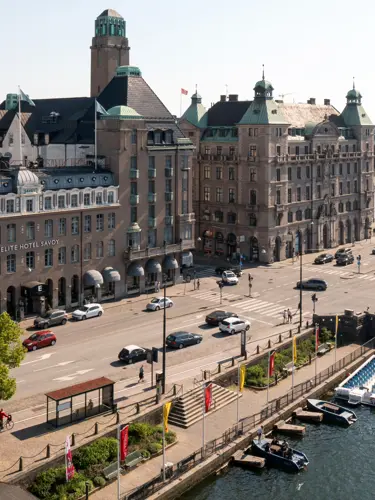 Beautiful buildings along a road by the water in Malmö