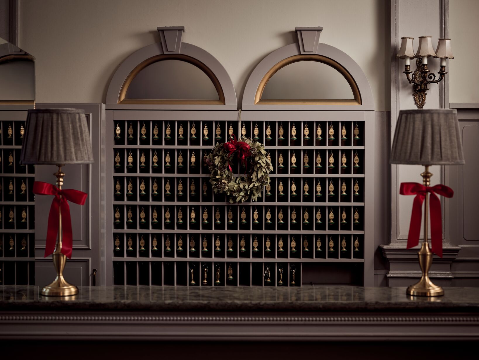 Decorative hotel reception desk with lamps