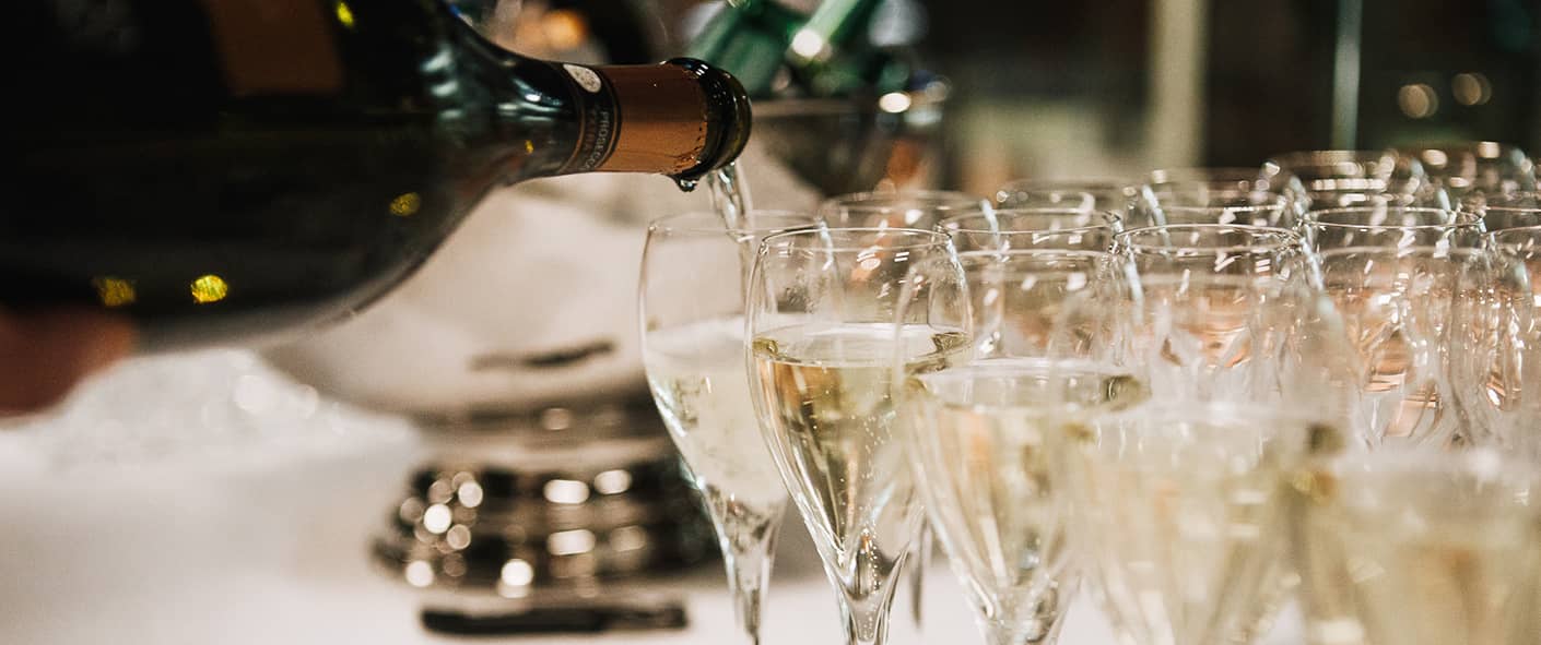 Champagne being poured into glasses