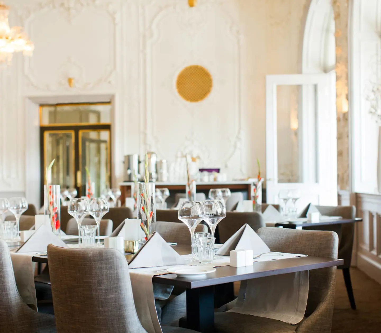 Magnificent dining room at Elite Hotel Grand in Gävle with set dining tables