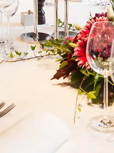 A beautifully decorated table with flowers
