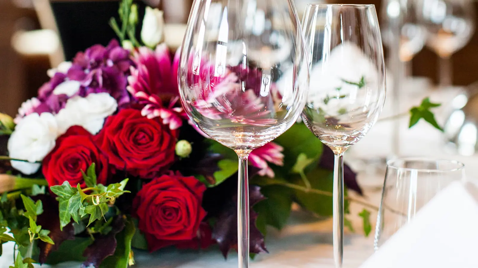 A decorated table with colorful flowers