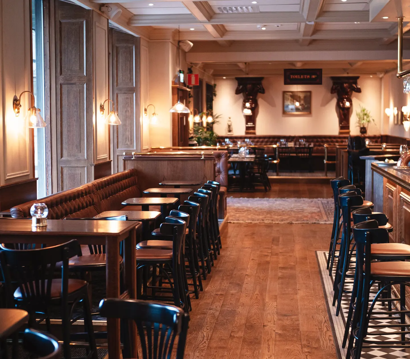 Pub environment with seating, bar and lights