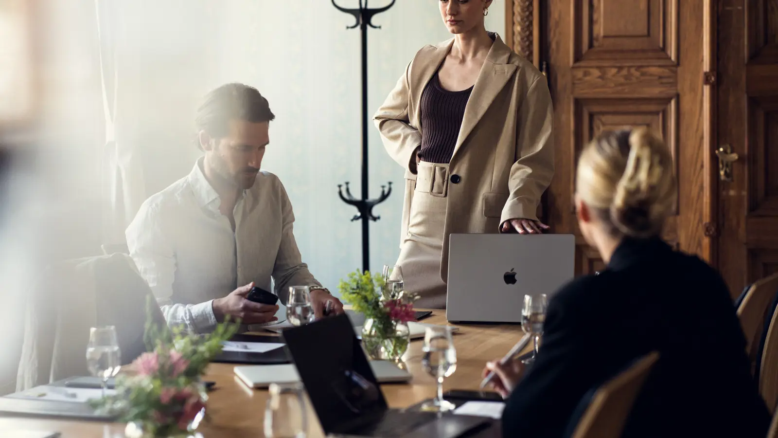 People conferencing around a conference table
