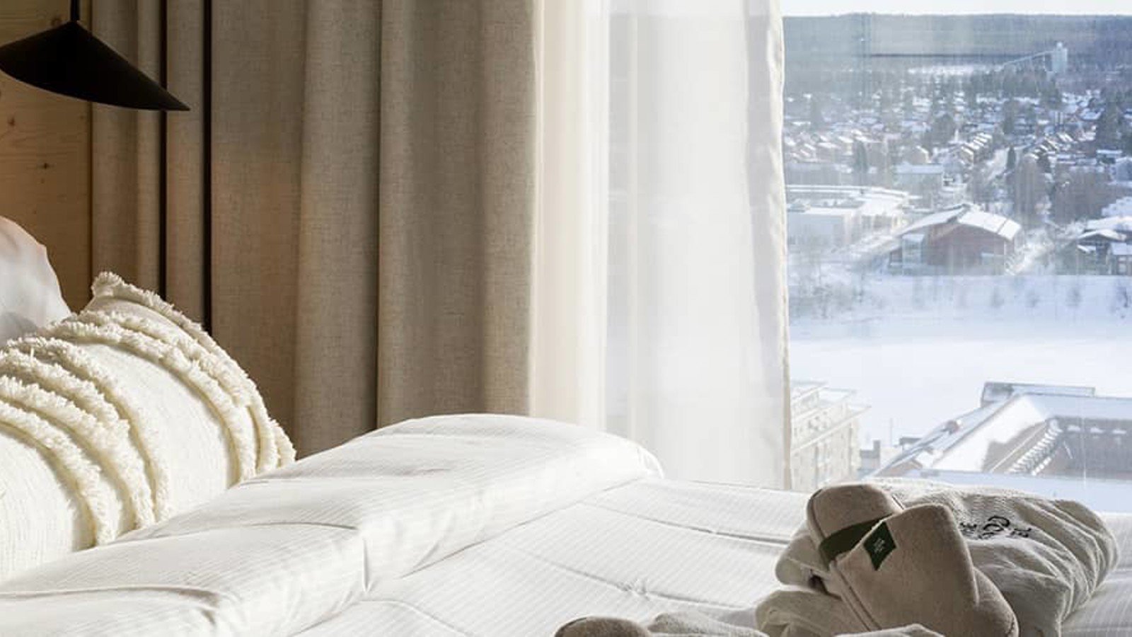 Cozy hotel room with a view of the winter landscape