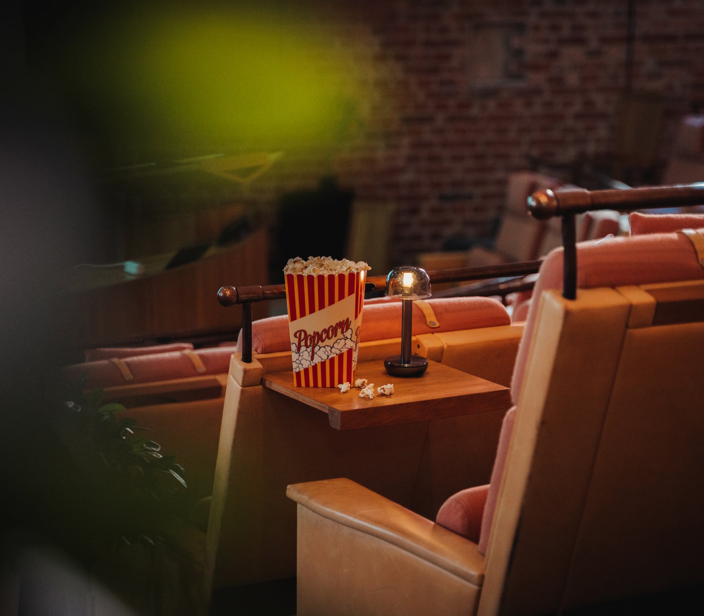 Popcorn on table in front of chair