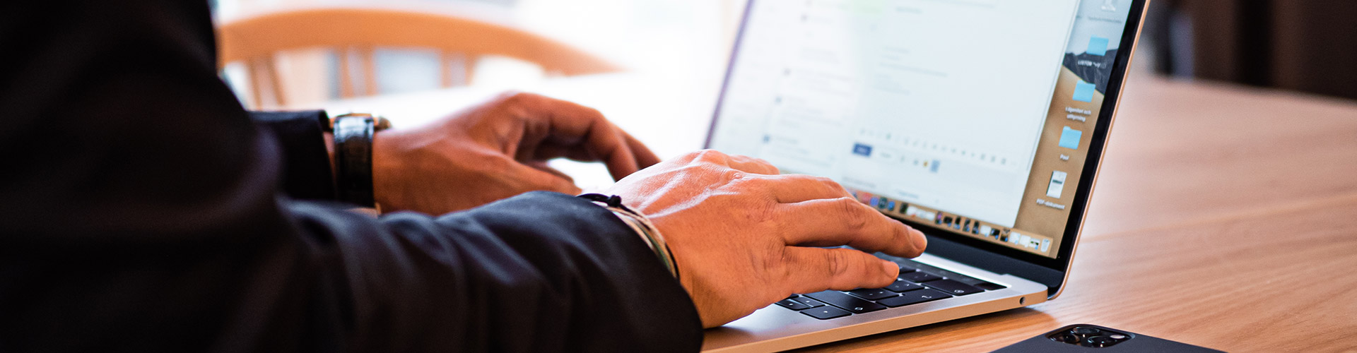 A laptop being used for a digital meeting