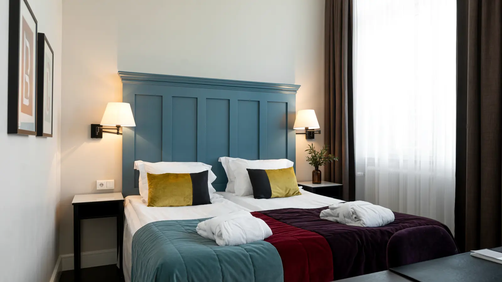 Hotel room with double bed and TV