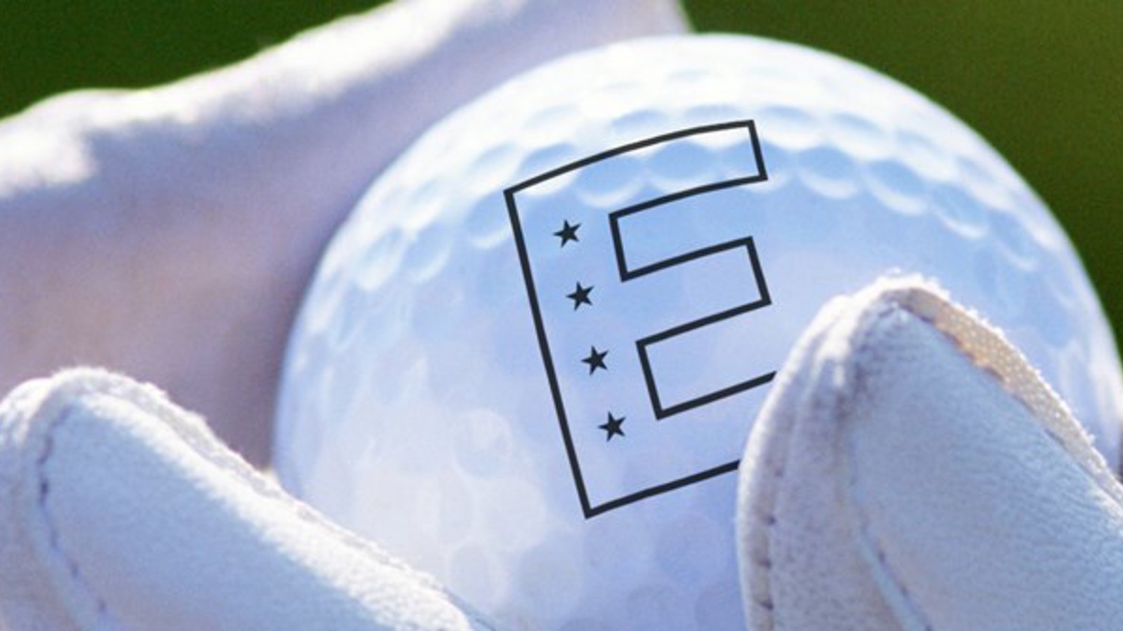 Golf ball with Elite Hotel logo