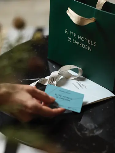 A gift card with Elite Hotels logo