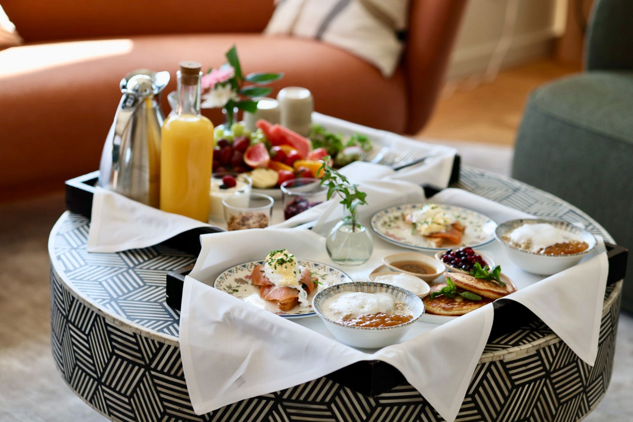 Breakfast tray laid out against a green background