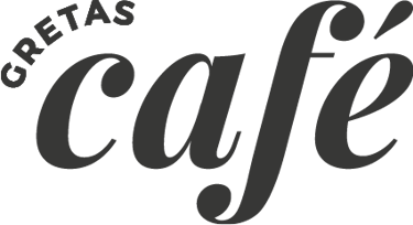behind the cash register at the cafe