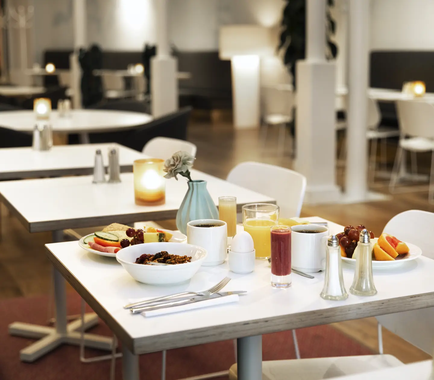 Breakfast served on a white table