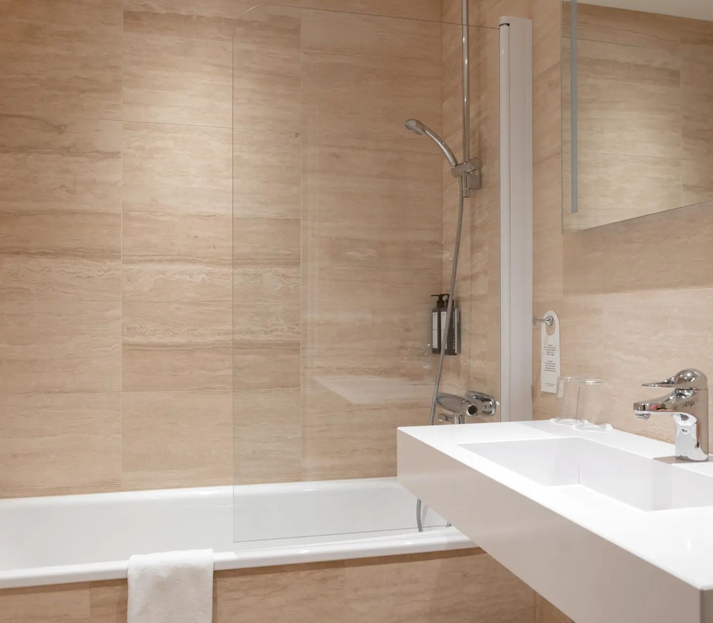Bath and sink in bathroom